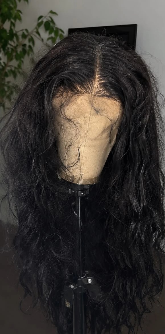 Before: the same wig frizzy, tangled and dull with a messy hairline